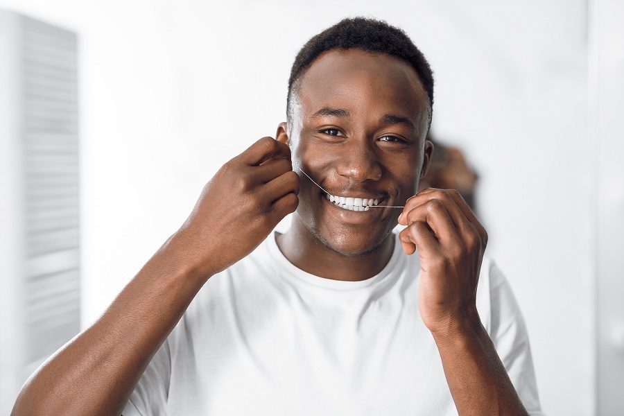 Is Flossing With Veneers Any Different?